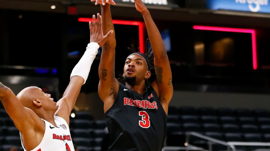 Seneca Knight wears red and white